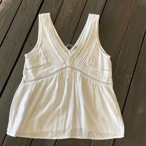 White tank with ladder trim